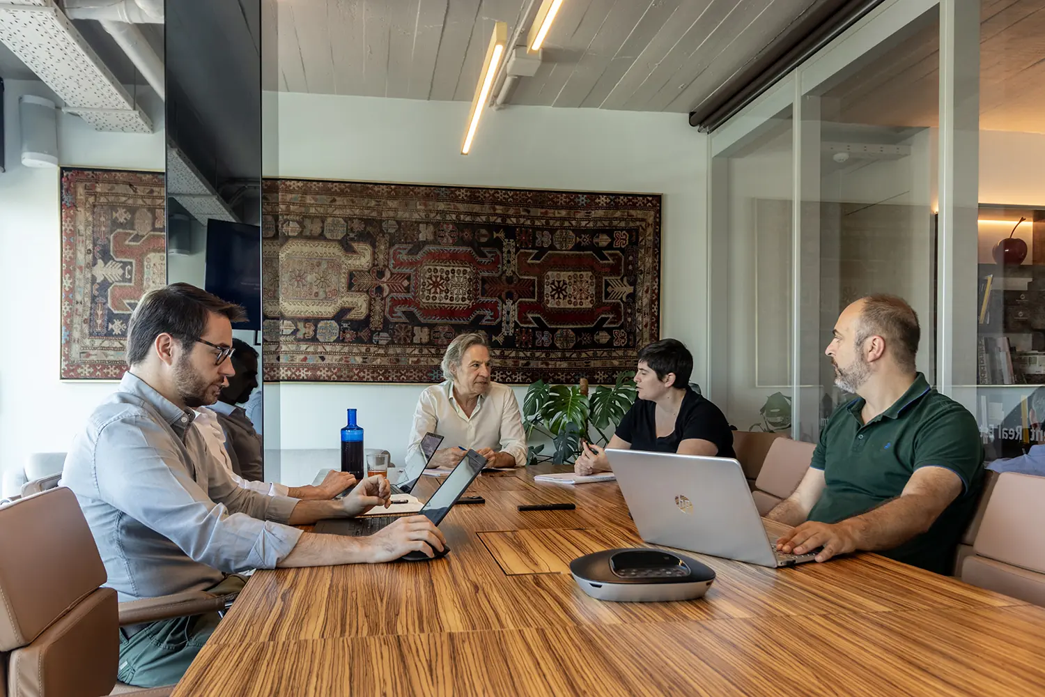 TOTE SER Capital team in a meeting