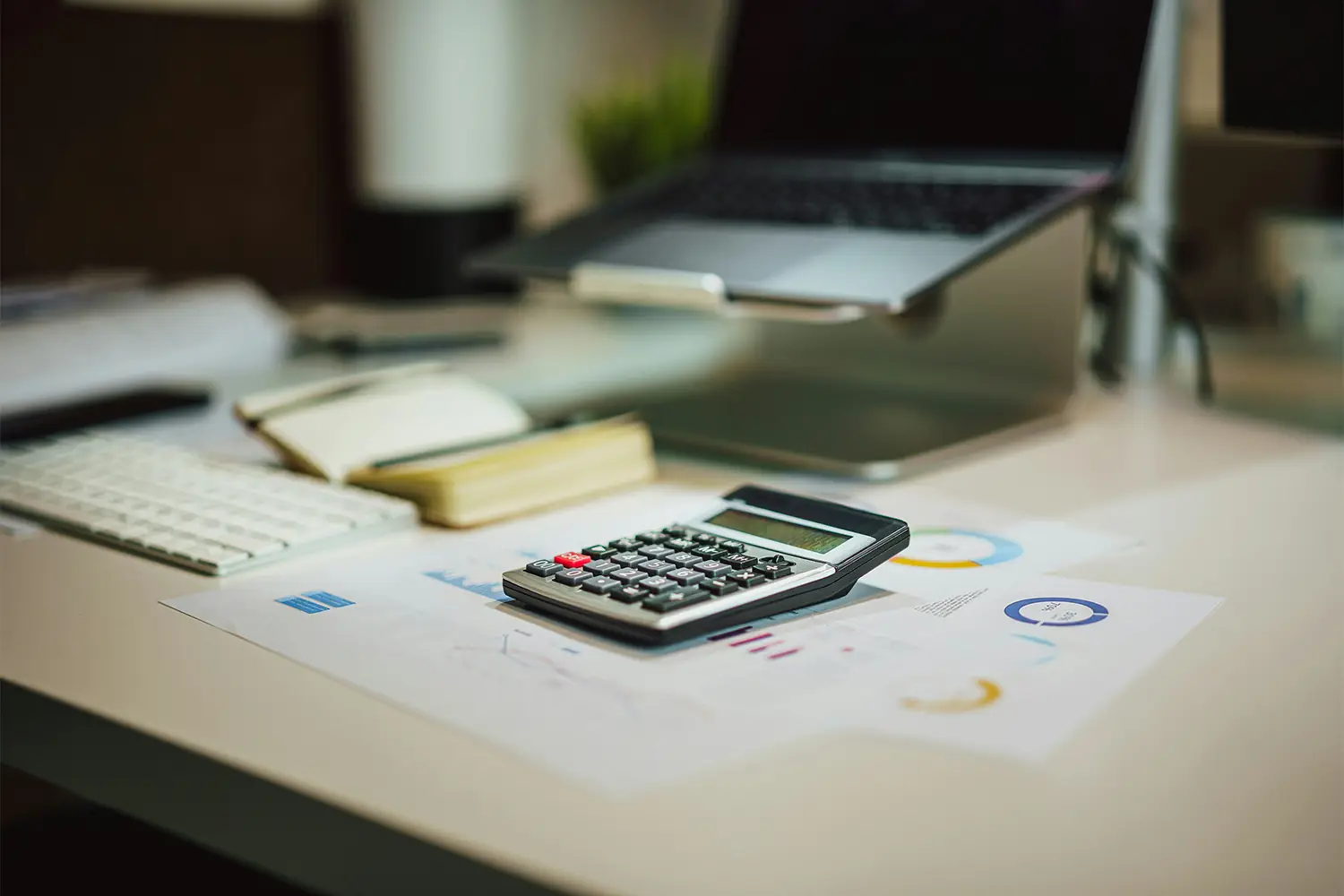 Calculator over papers in a desk